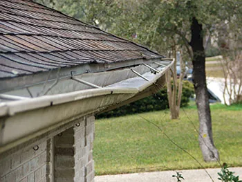 damage to gutters on Minneapolis house