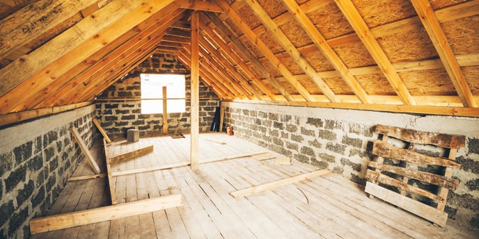 Interior photo of unfinished attic in Minneapolis home