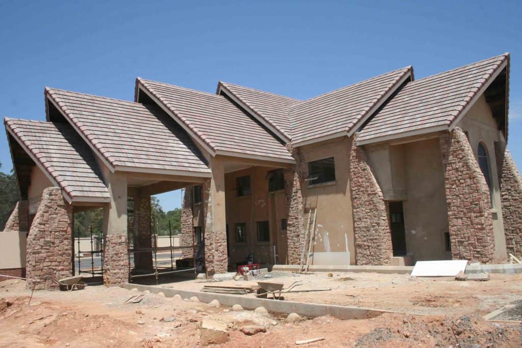 Home in minneapolis being built with concrete roof