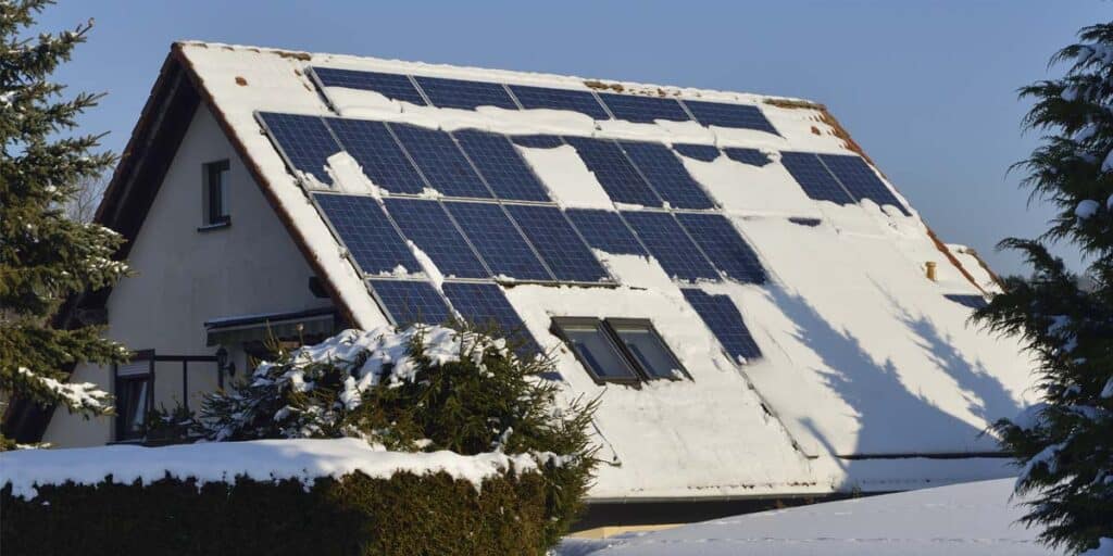 a Minneapolis home in the winter with solar panels 