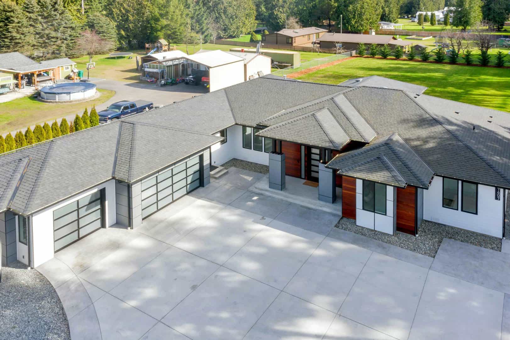 Over head shot of house with new roof installation by Minneapolis roofing company
