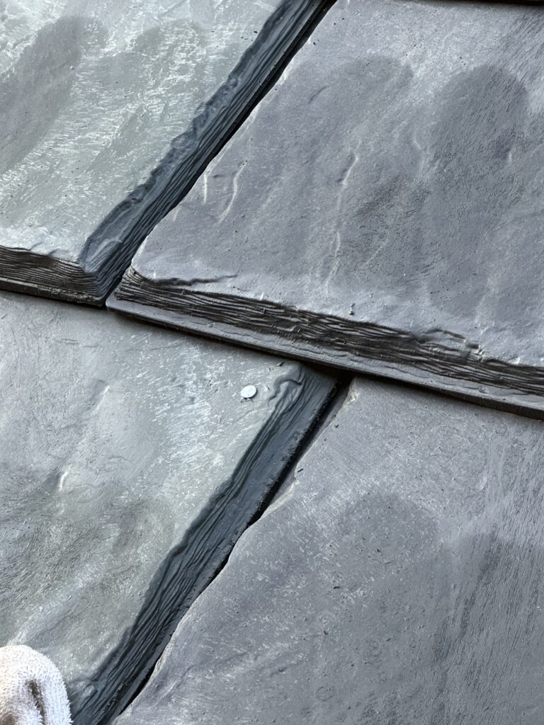 A close up image of imitation slate roofing on a Minneapolis home.